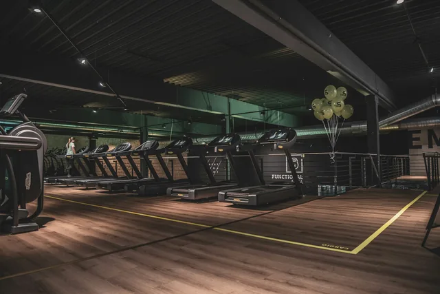 Treadmills and circulation space inside a gym in Erlangen, Germany.